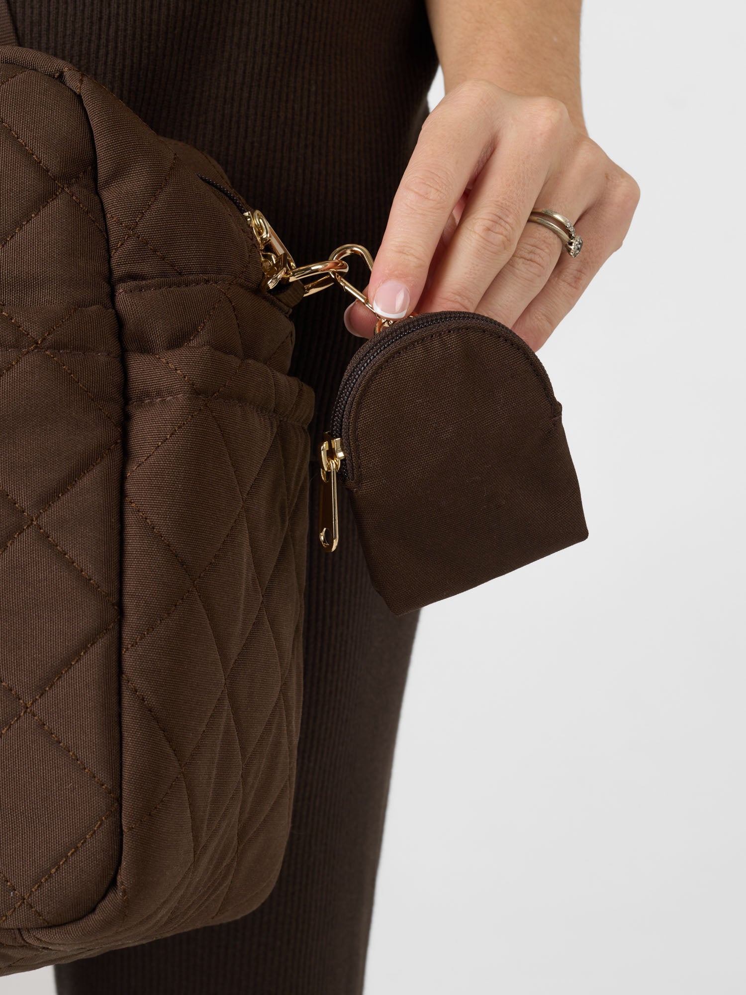Brown pacifier pouch for keeping baby essentials organised and within reach