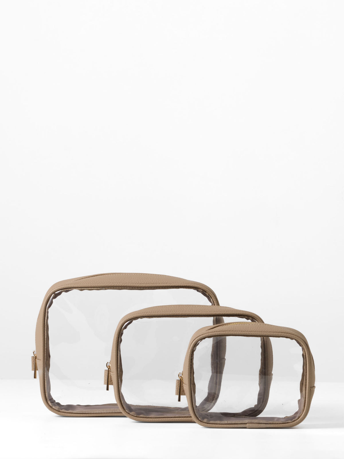 Set of three clear organiser cases with taupe vegan leather trim