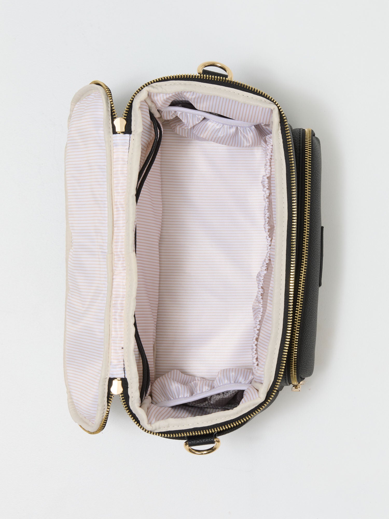 Baby stroller organiser featuring insulated bottle pockets and organised internal storage
