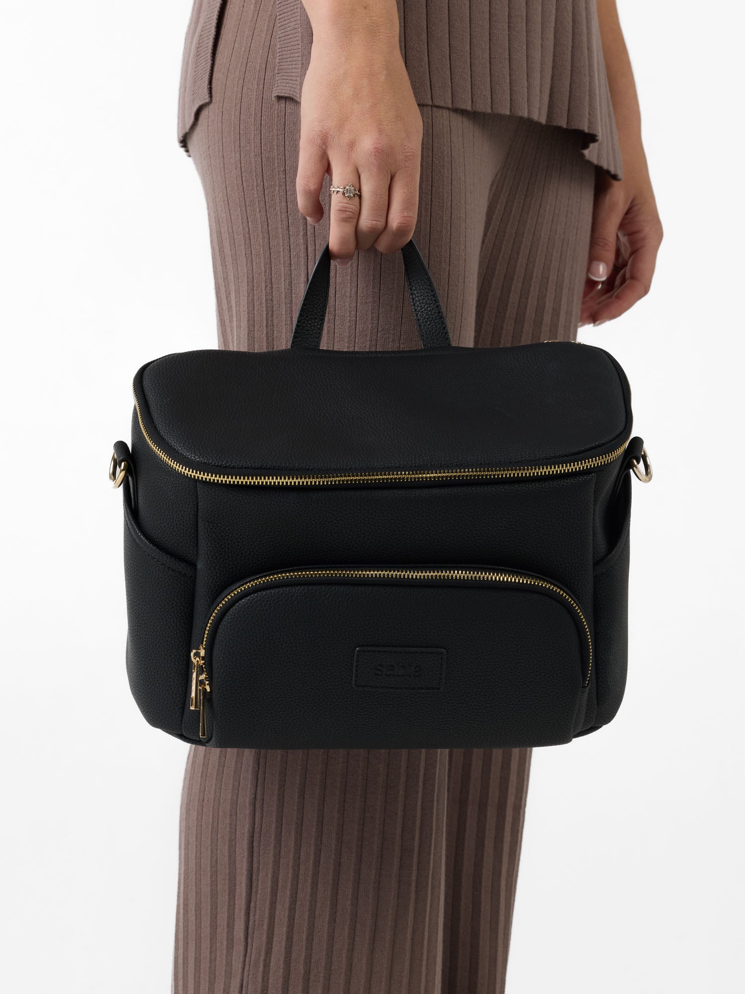 Black Vegan leather pram caddy with top carry handle and adjustable pram straps