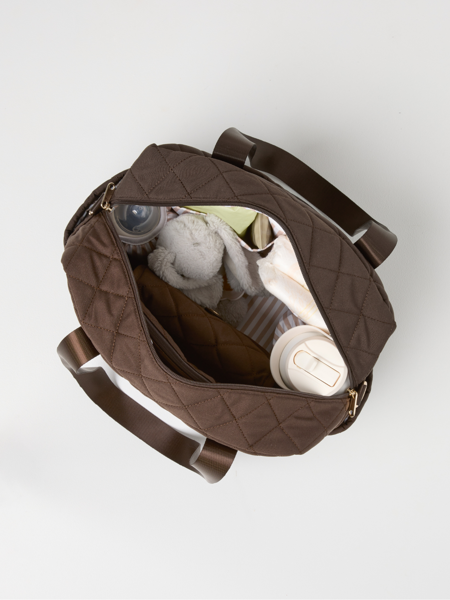 Chocolate Quilted Nappy Bag quilted nappy bag with spacious storage for baby travel and everyday parenting soft breathable linen fabric