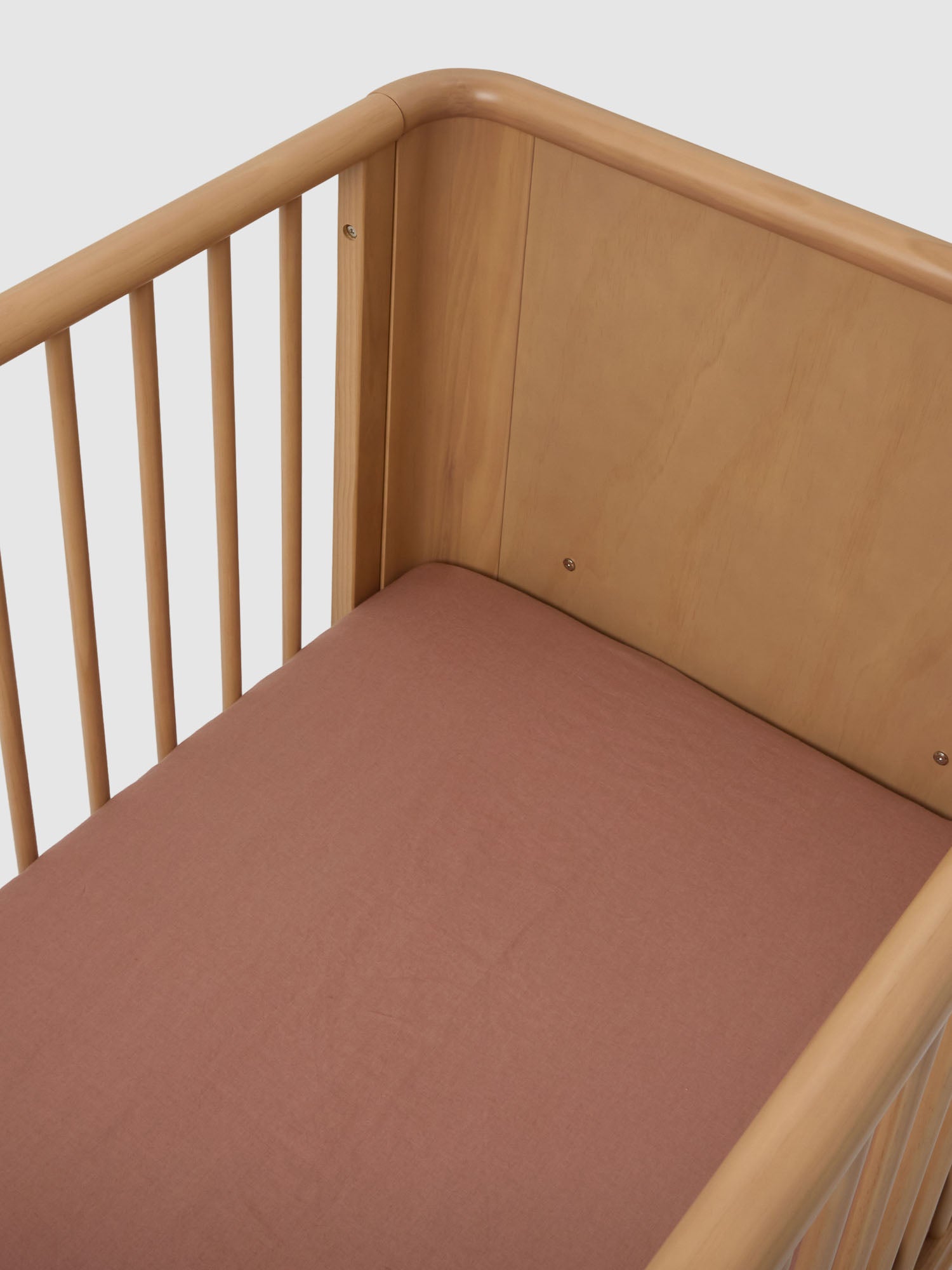 Clay Linen Cot Sheet made from breathable 100% pure linen baby bedding for modern nursery styling luxury nursery essential