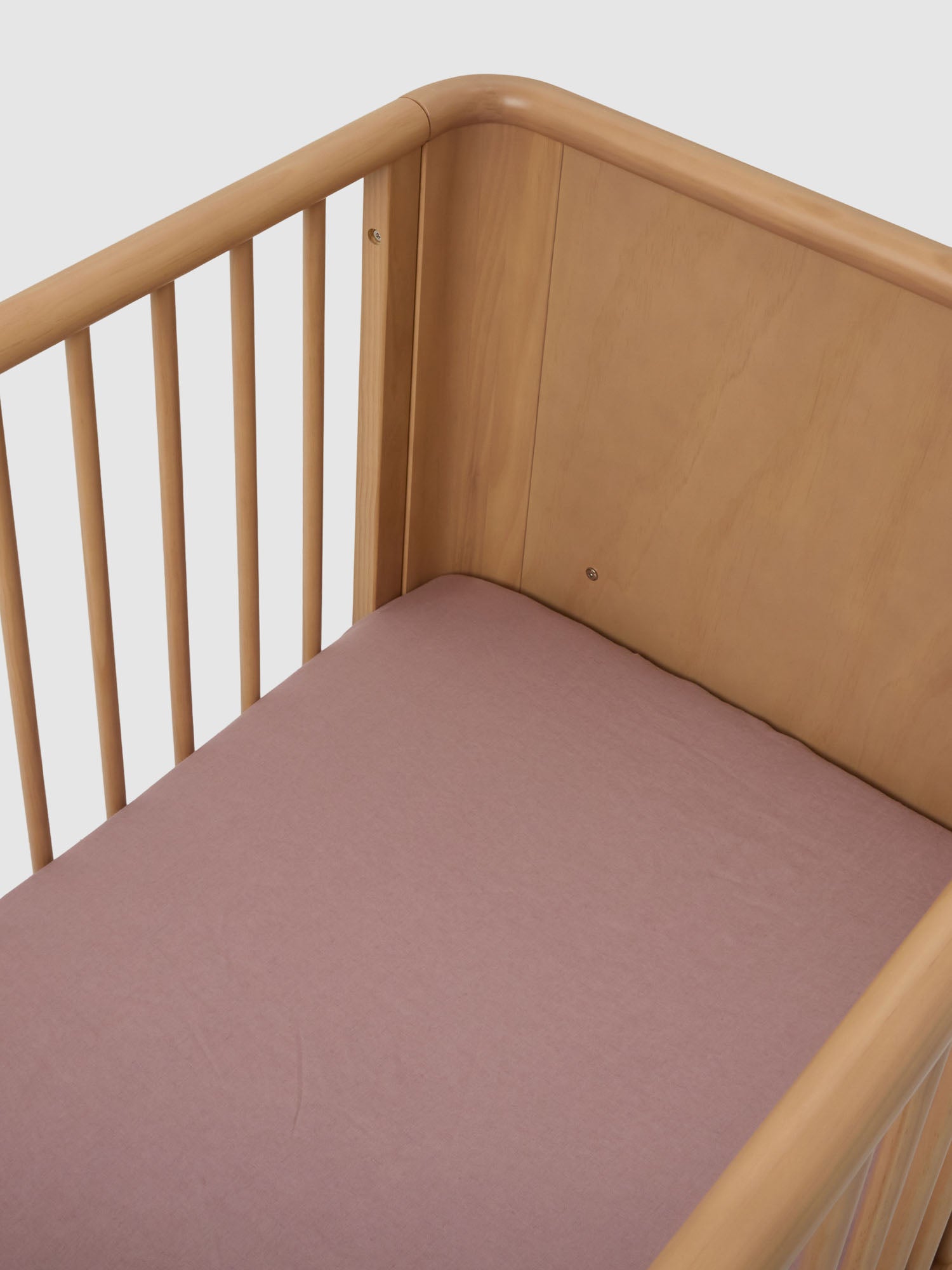 Dusty Pink Linen Cot Sheet made from breathable 100% pure linen baby bedding for modern nursery styling luxury nursery essential