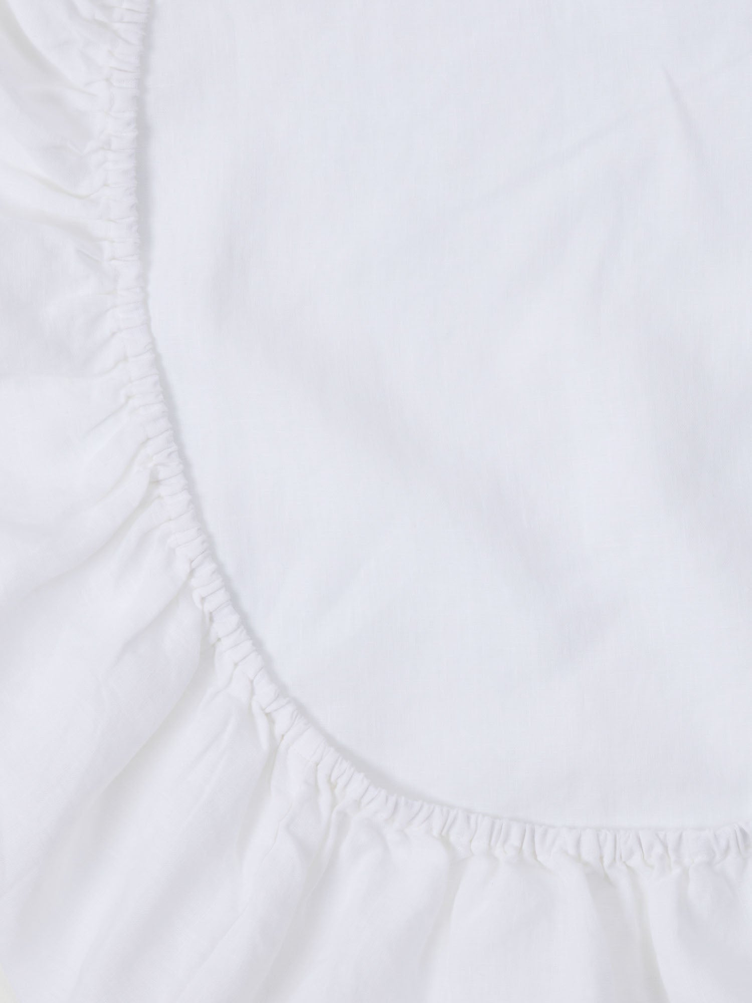 White Linen Sheet made from breathable 100% pure linen baby bedding for modern nursery styling luxury nursery essential