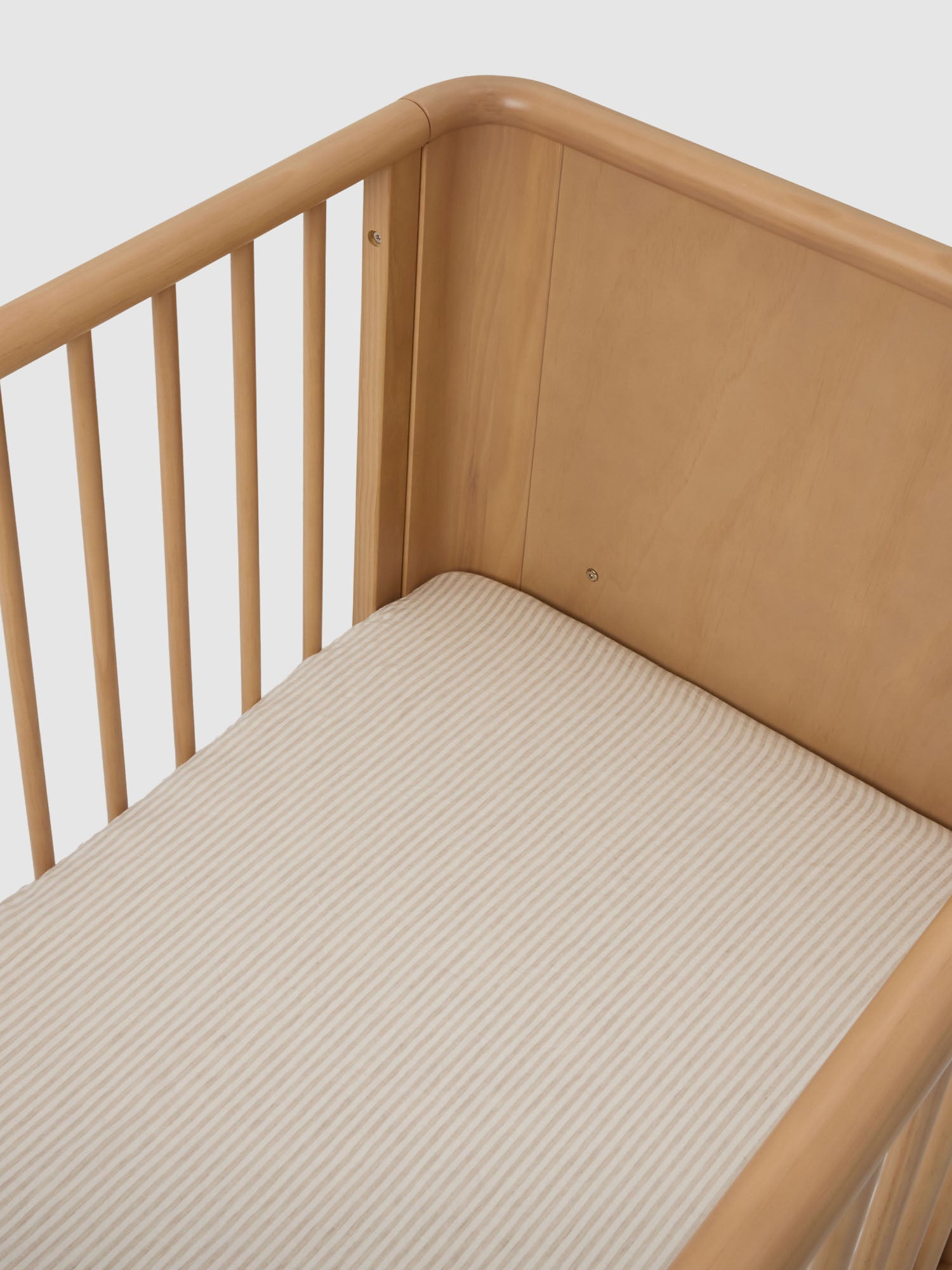 Natural Striped Linen Cot Sheet made from breathable 100% pure linen baby bedding for modern nursery styling luxury nursery essential
