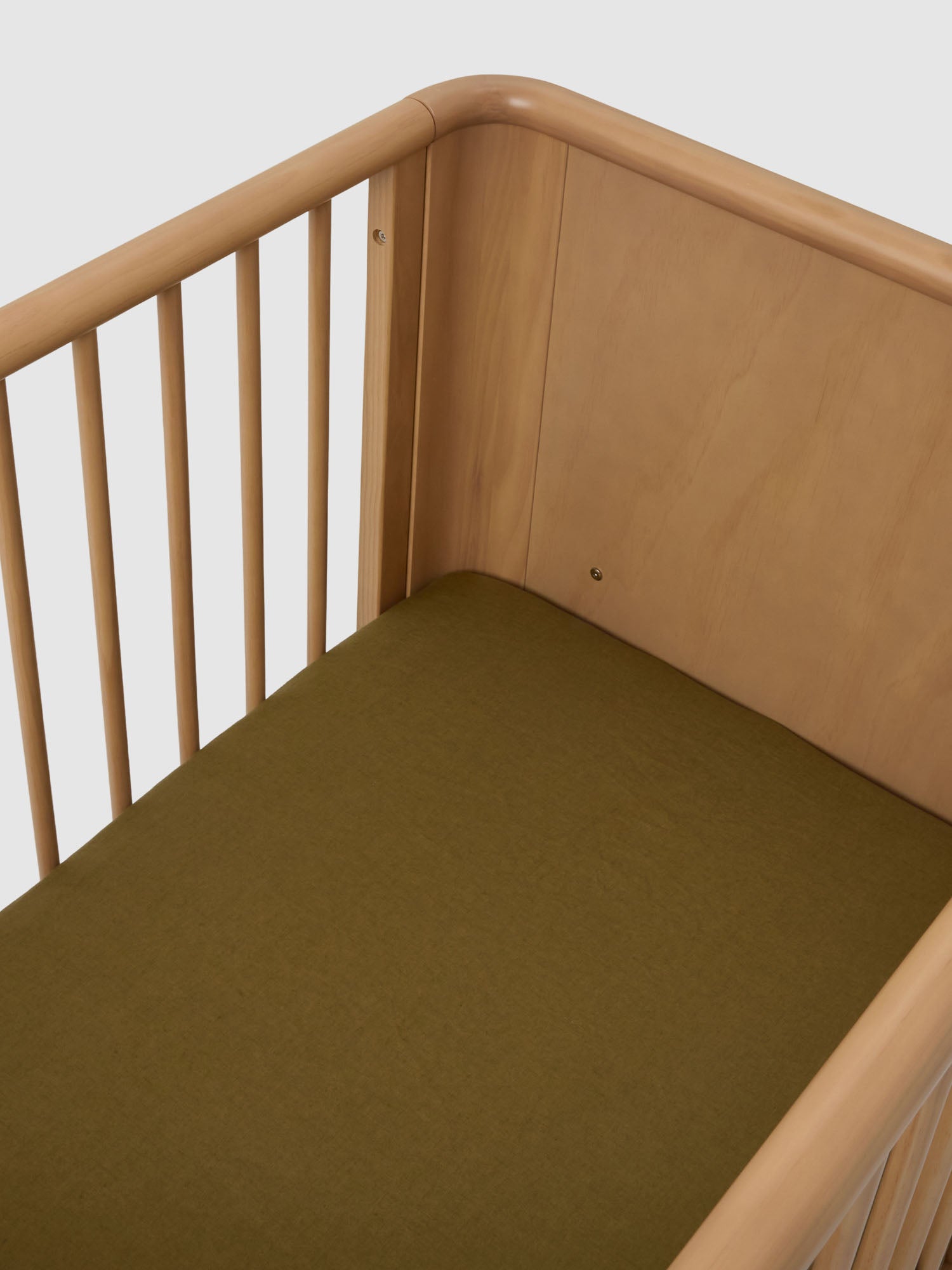 Olive Linen Cot Sheet made from breathable 100% pure linen baby bedding for modern nursery styling luxury nursery essential