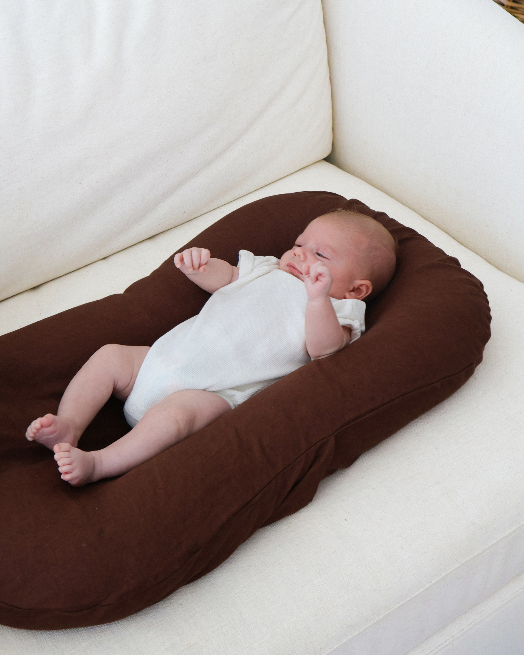 Supportive infant lounger for supervised time
