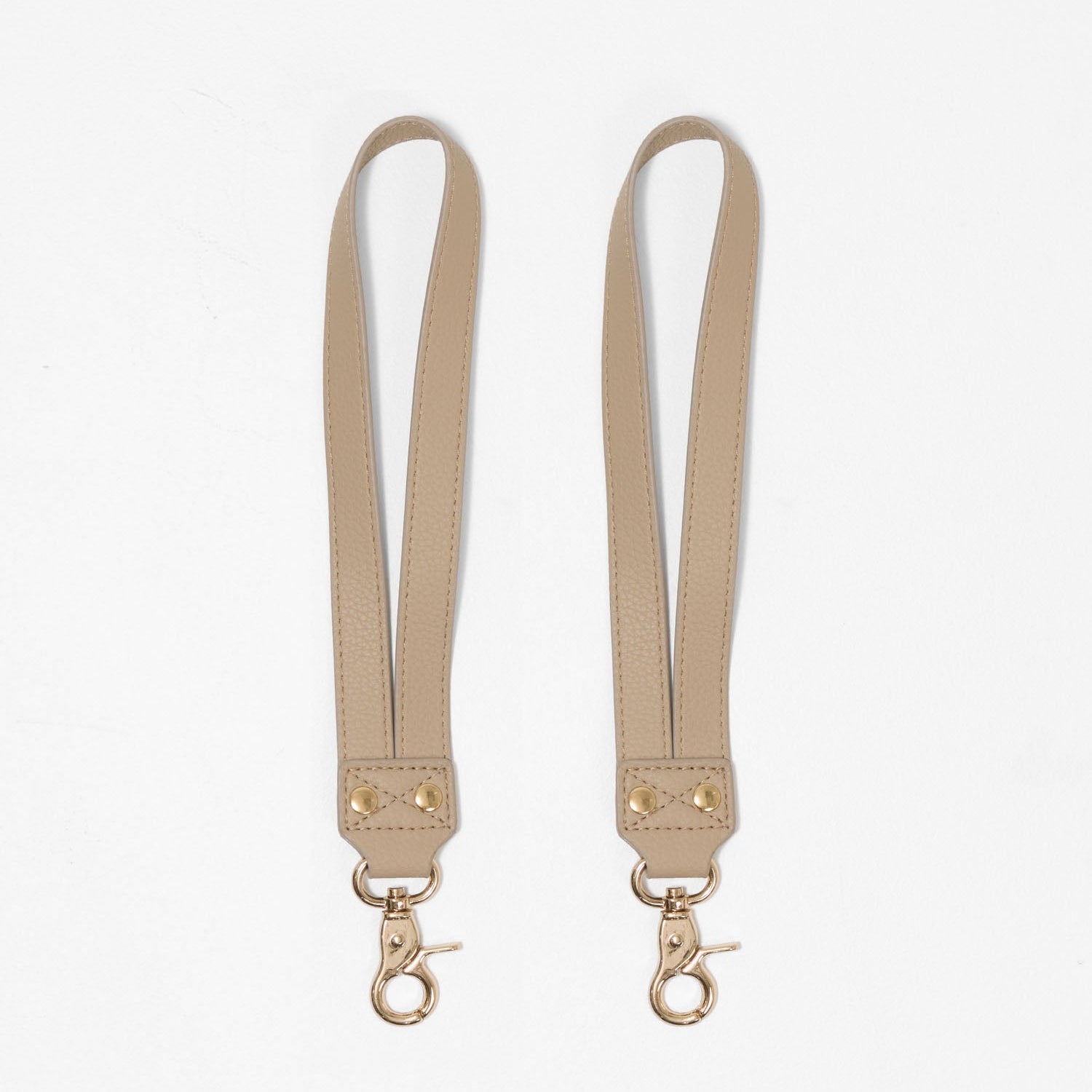 Vegan leather pram straps for attaching nappy bags and organisers to prams and strollers