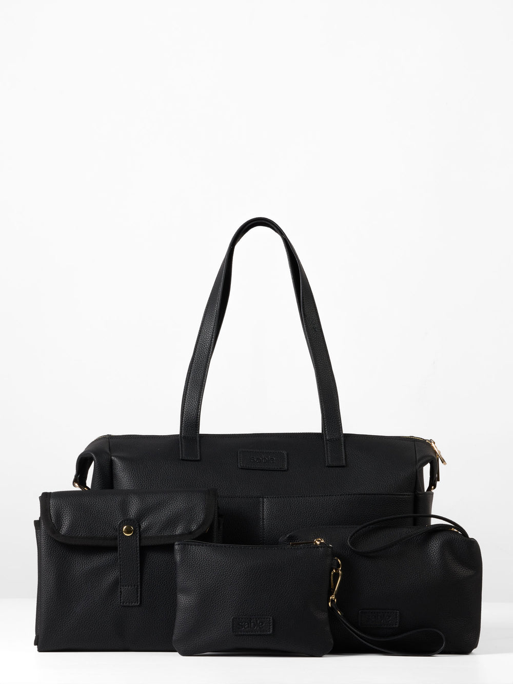 Black nappy bag set containing a nappy bag, change mat, wet bag and small zipped pouch 