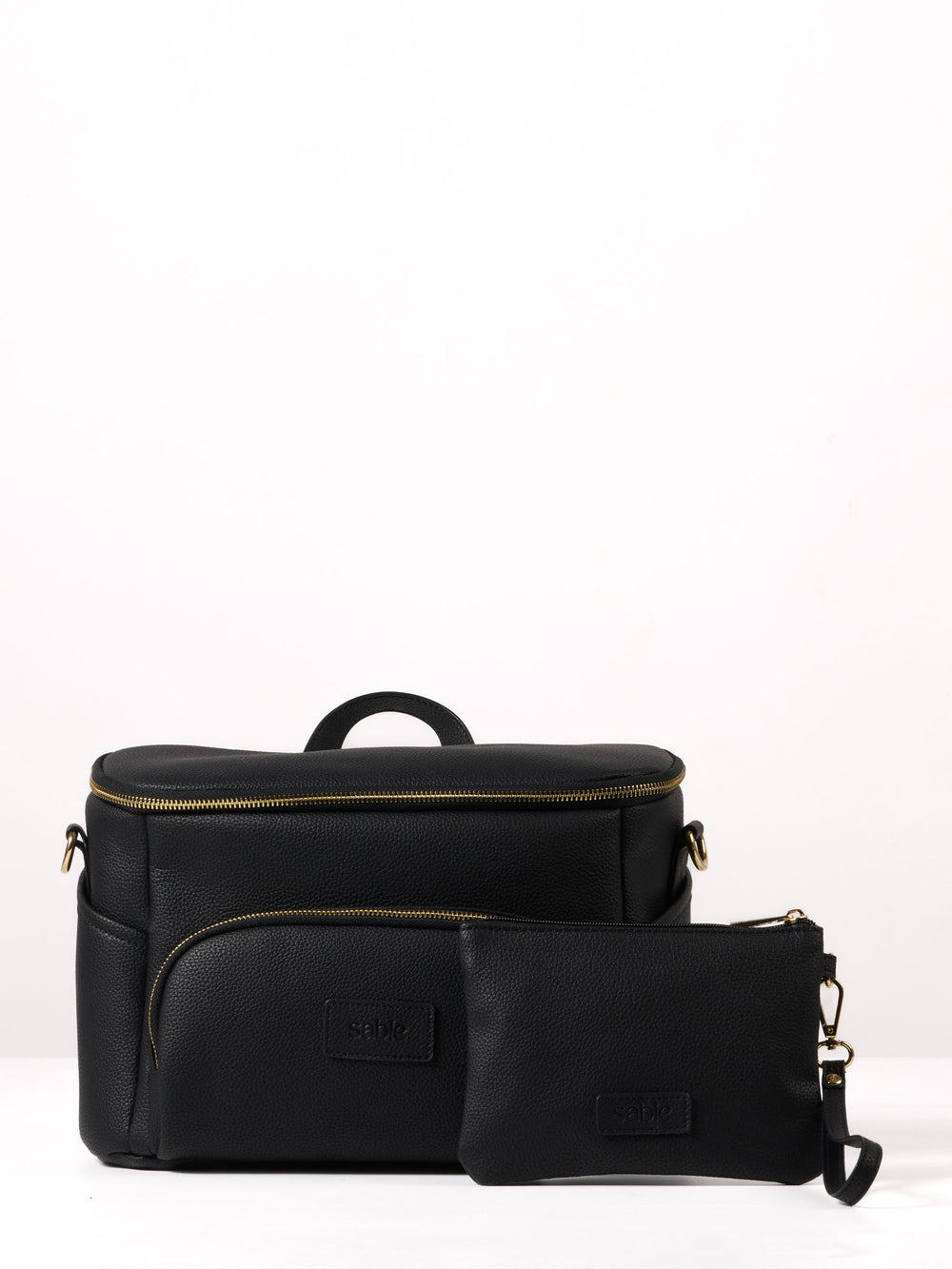 Black vegan leather pram caddy with matching Essentials Pouch