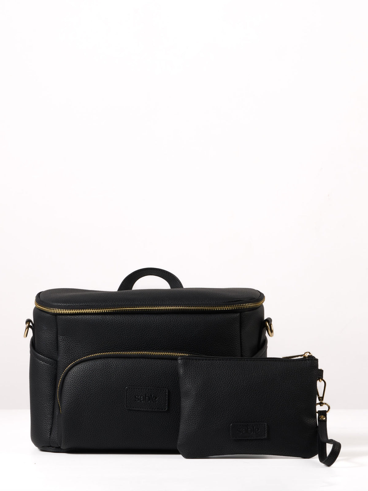 Black vegan leather pram caddy with matching Essentials Pouch