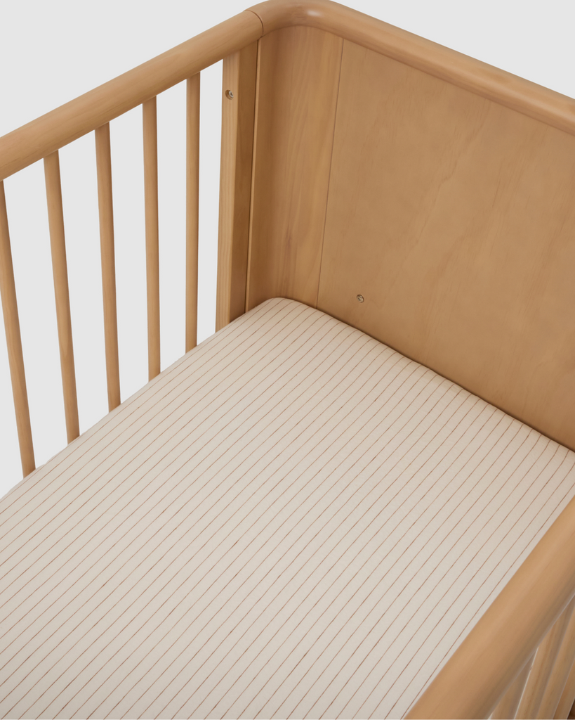 Soft fitted cot sheet in lightweight linen