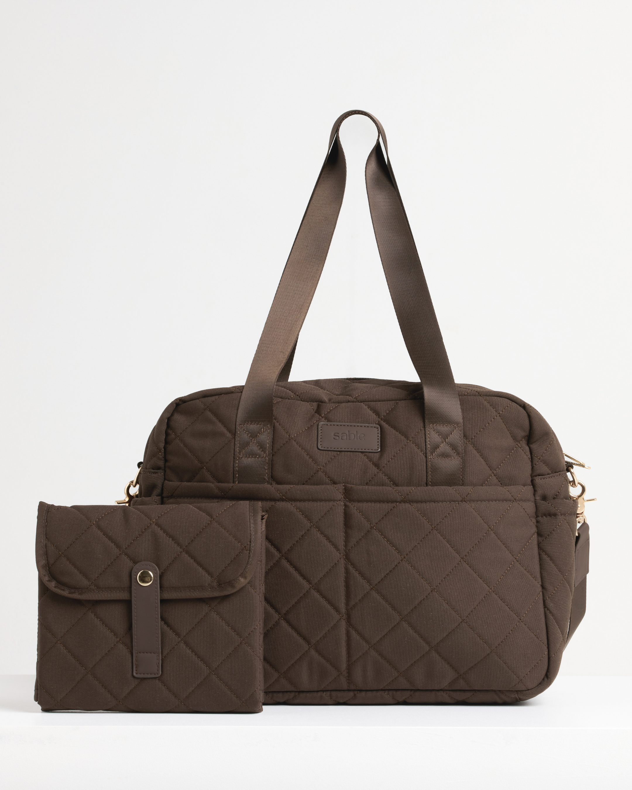 Brown baby bag and change mat essentials set