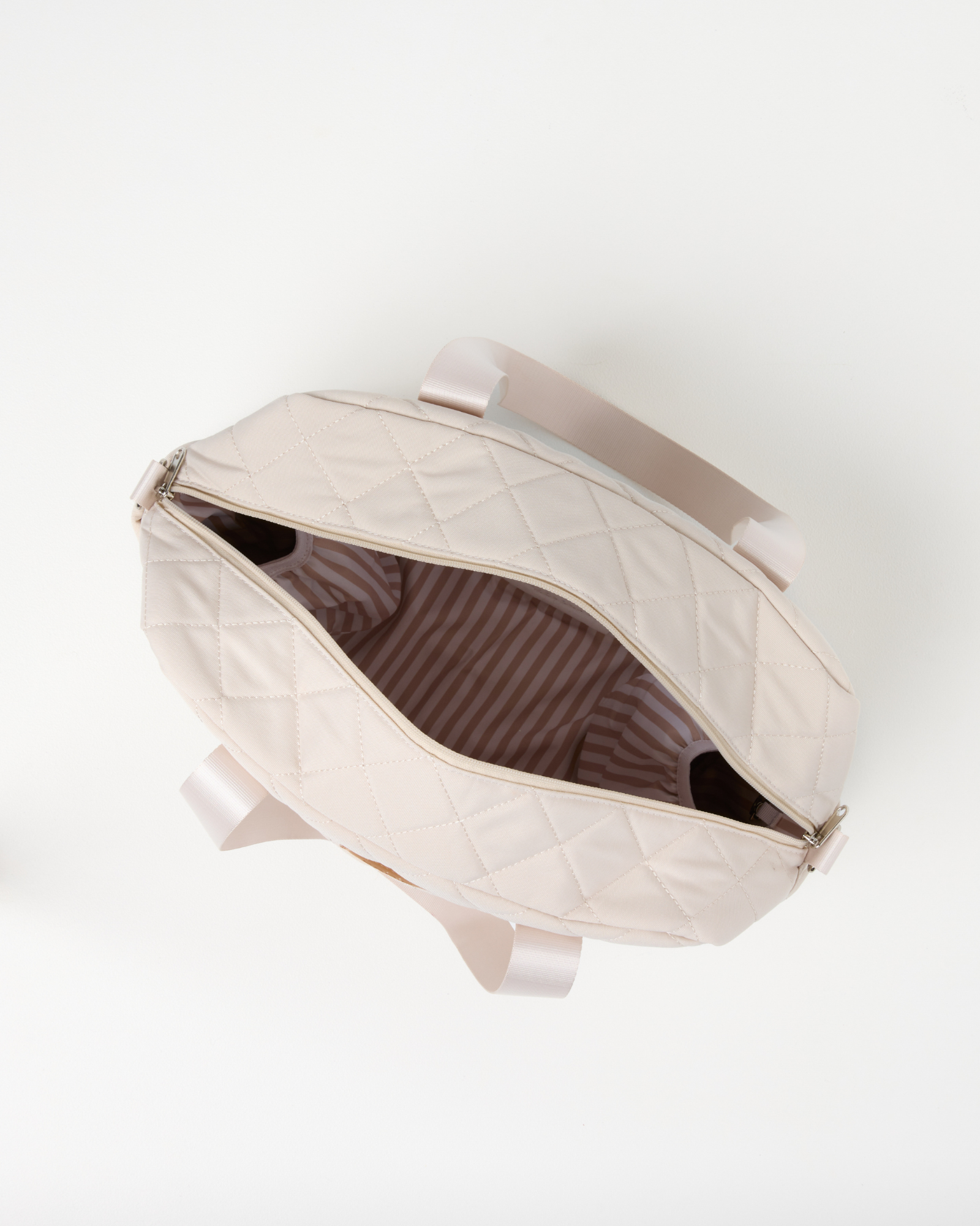 Sand Quilted Nappy Bag quilted nappy bag with spacious storage for baby travel and everyday parenting neutral nursery styling