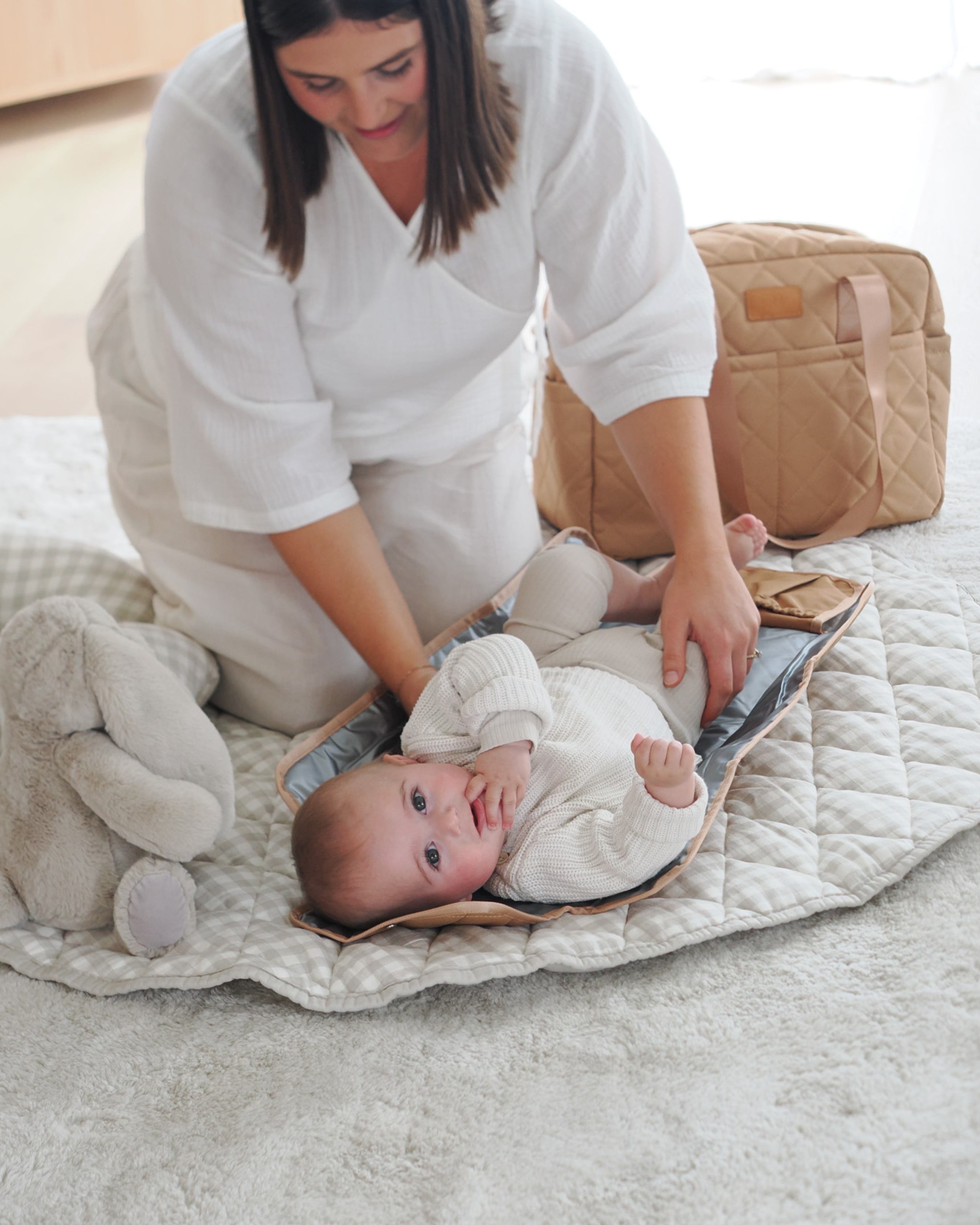 Padded linen playmat in neutral tone