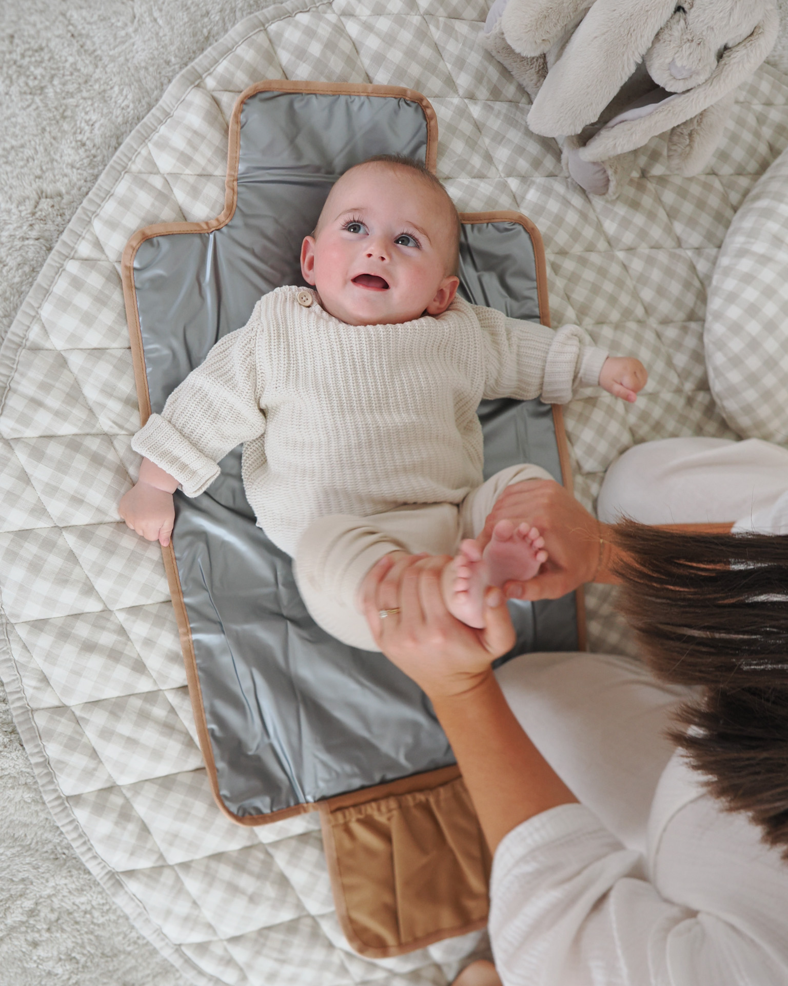 Round linen playmat for tummy time and play