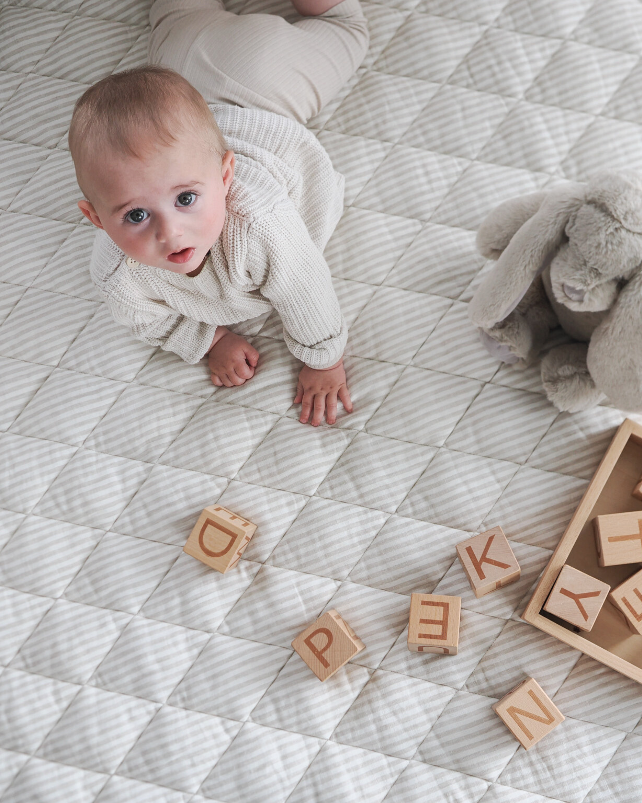Foldable linen playmat for easy storage and travel