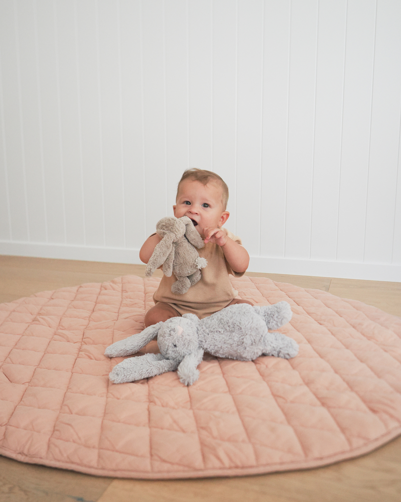 Foldable linen playmat for easy storage and travel