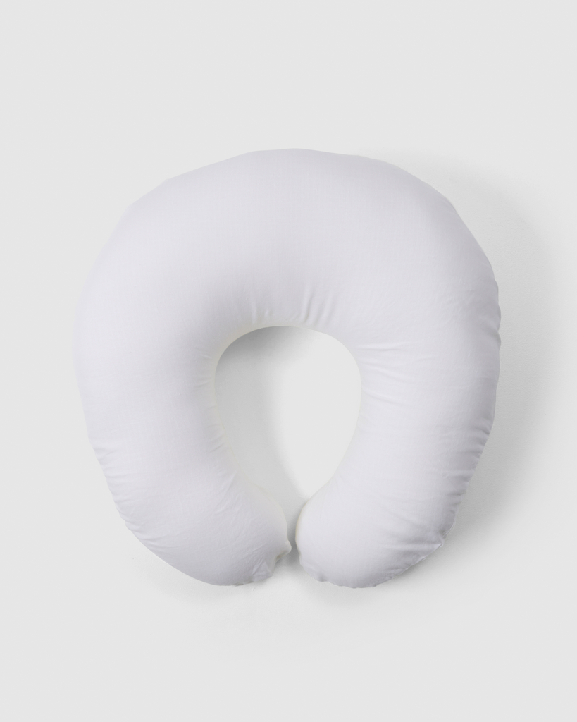 Breastfeeding pillow in white linen
