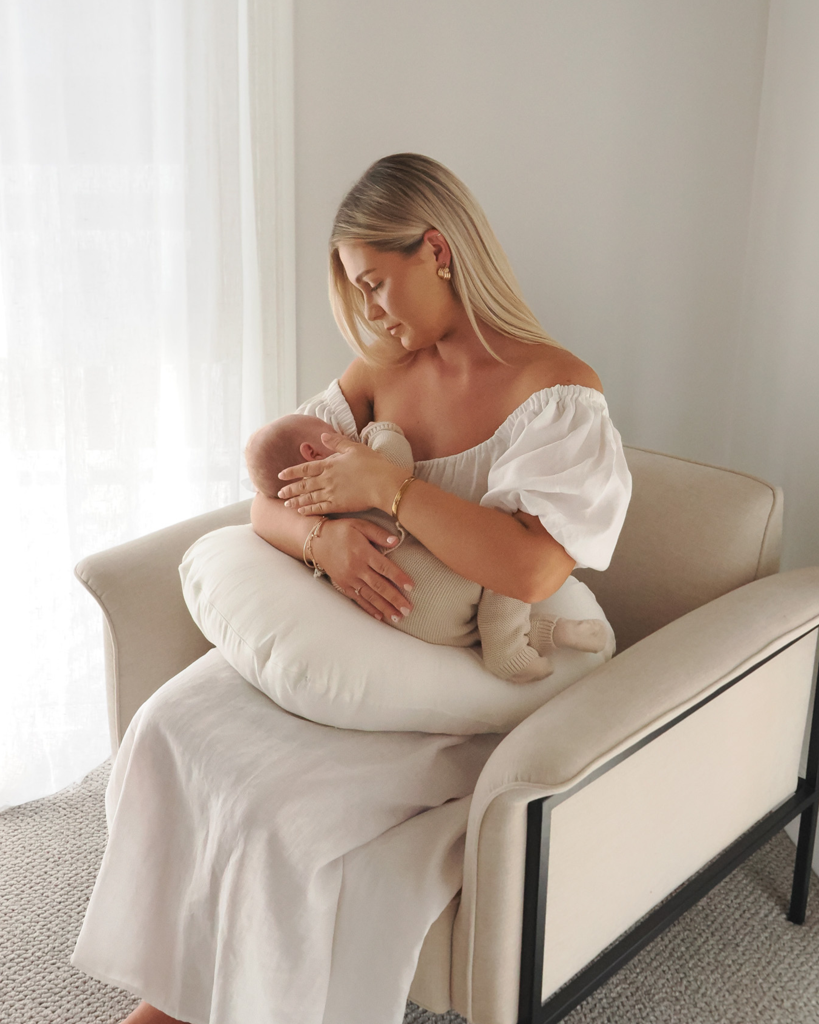 Newborn nursing pillow for comfort and support