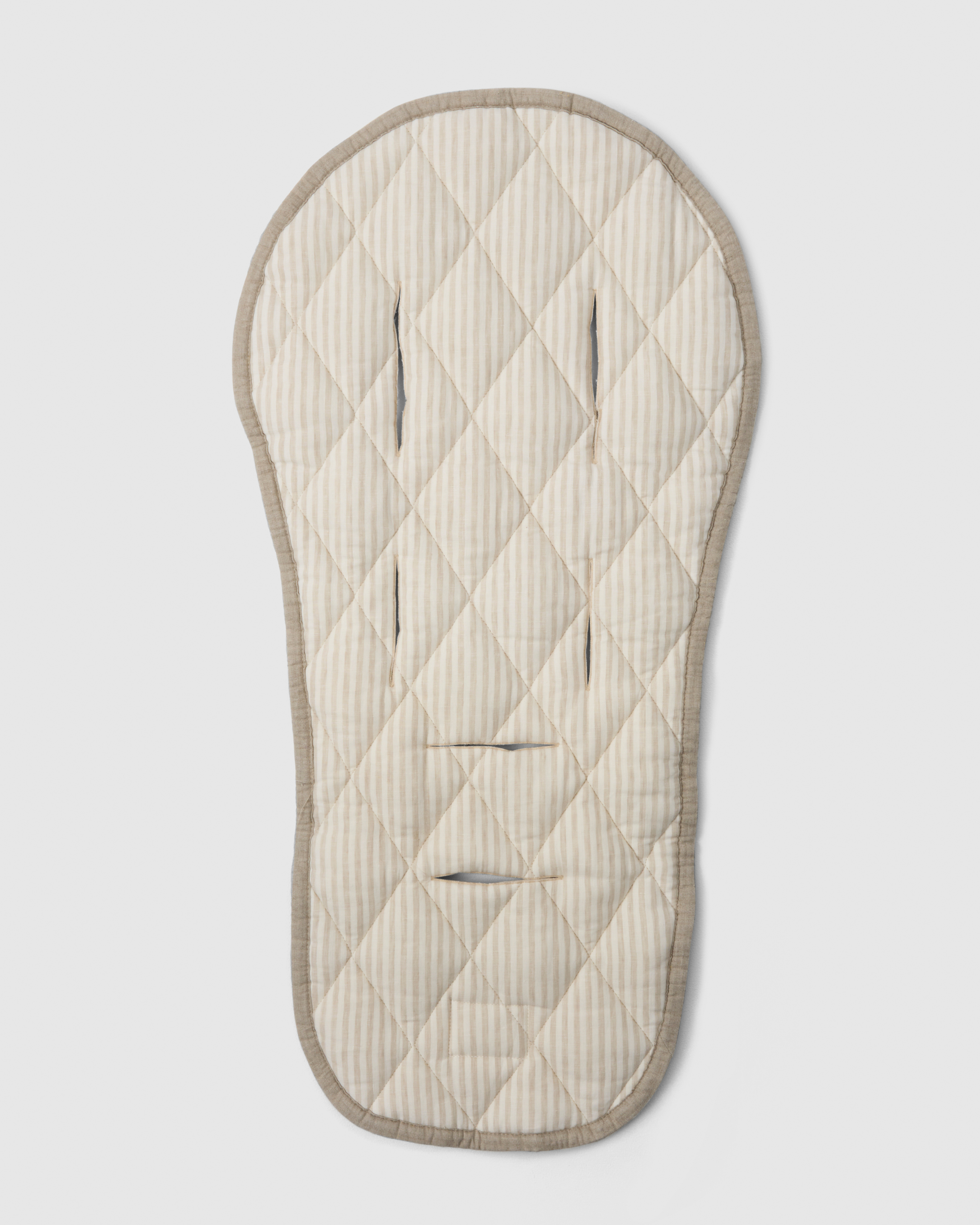 Quilted pram liner with reversible design