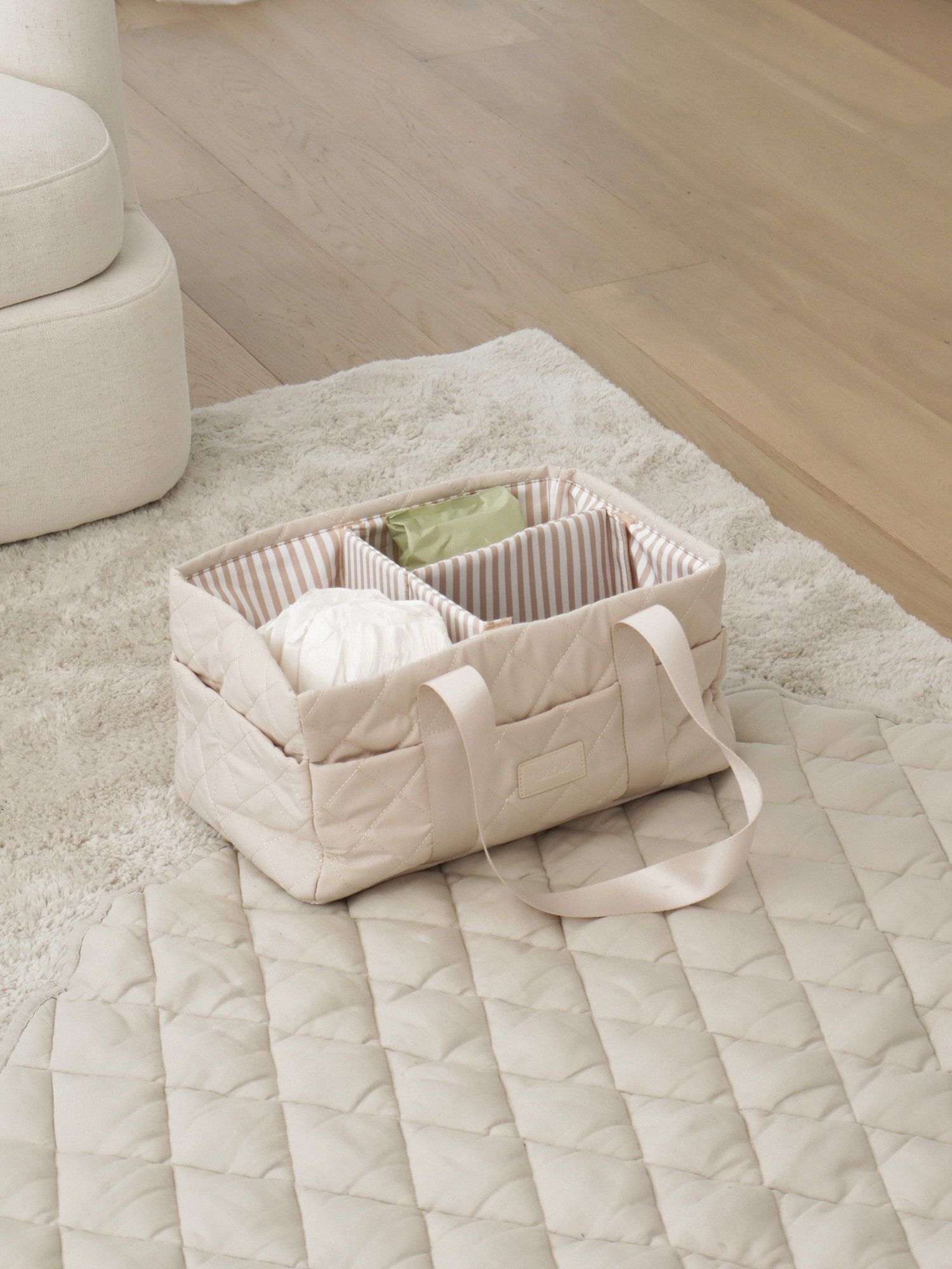 Sand Quilted Nappy Caddy quilted nappy caddy for organising nursery and baby change essentials luxury nursery essential