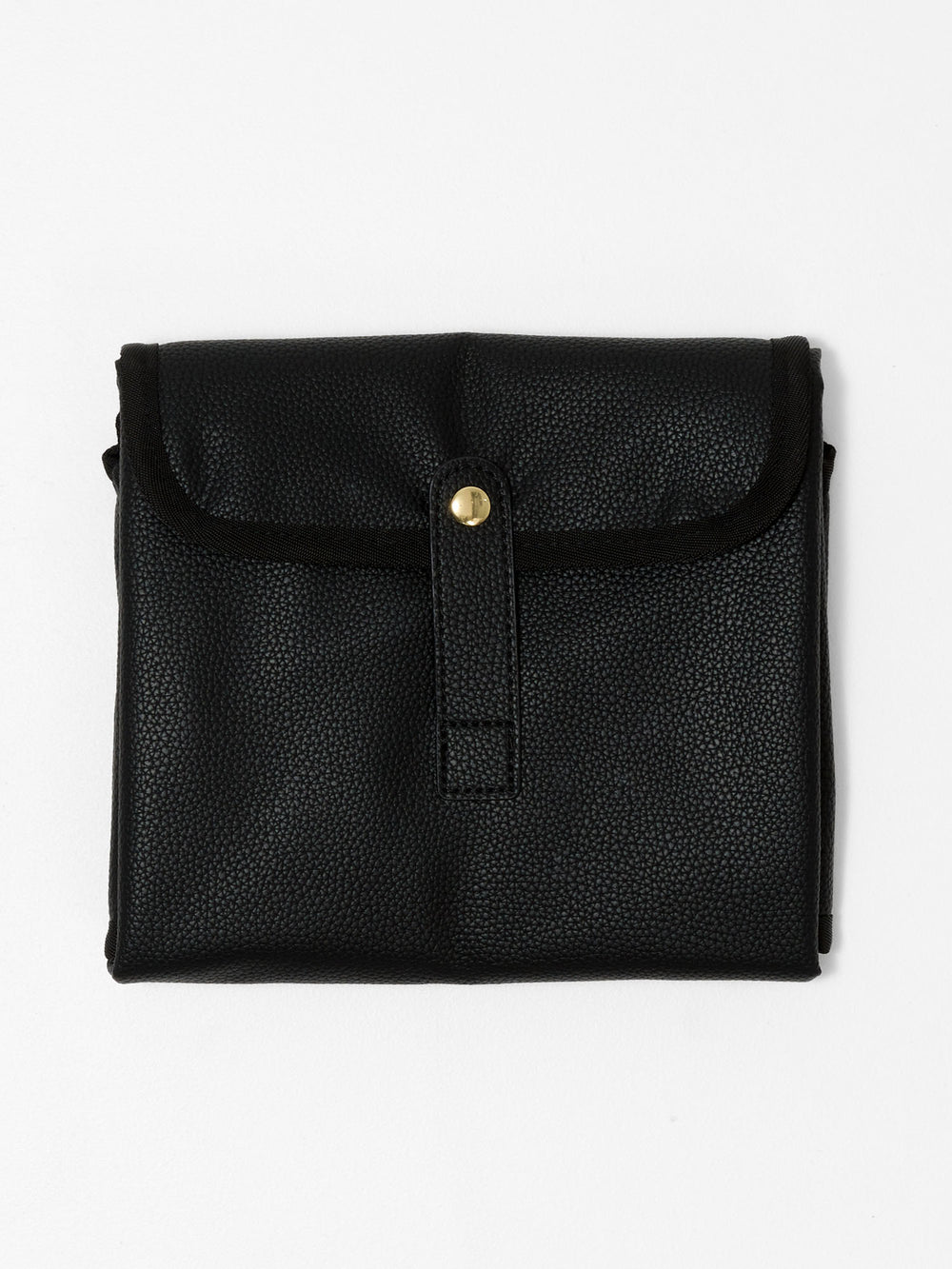 Black vegan leather change mat folded closed with snap tab