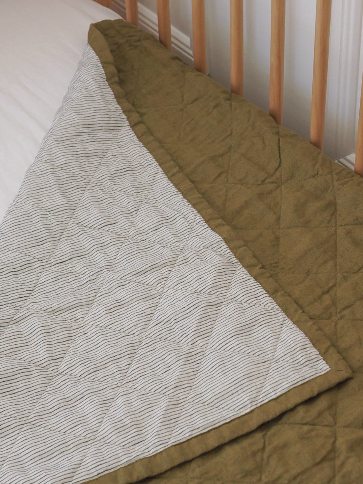 Olive and Pinstriped Cot Quilt luxury linen cot quilt for modern nursery decor and baby room styling 100% pure linen baby bedding