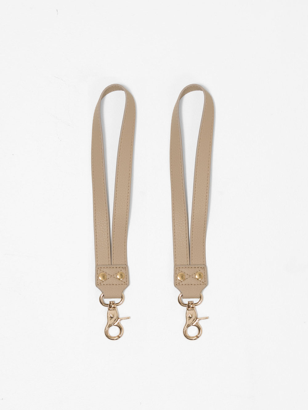 Vegan leather pram straps for attaching nappy bags and organisers to prams and strollers