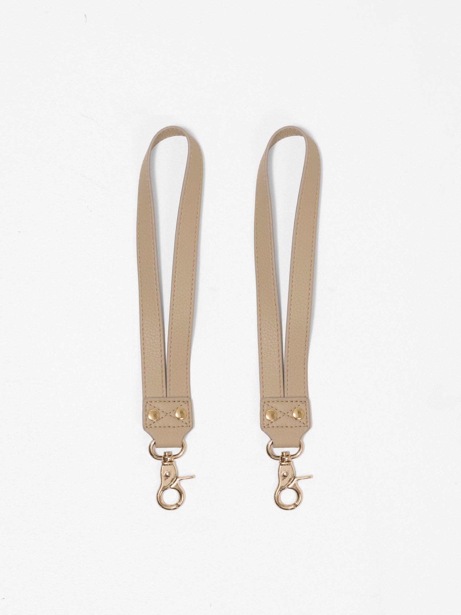 Vegan leather pram straps for attaching nappy bags and organisers to prams and strollers