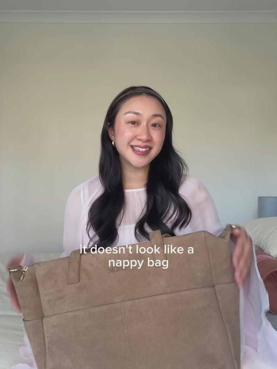 Video of the Sable Bebe Brown Nappy Bag in Suede talking about all the details and functions of the bag