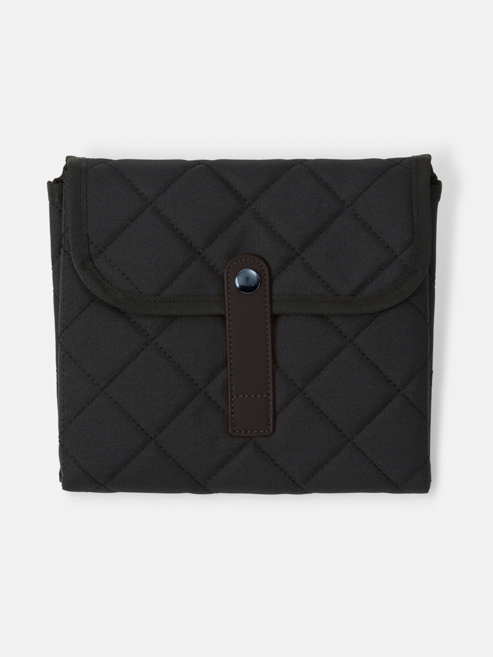 Black quilted change mat folded closed with snap tab