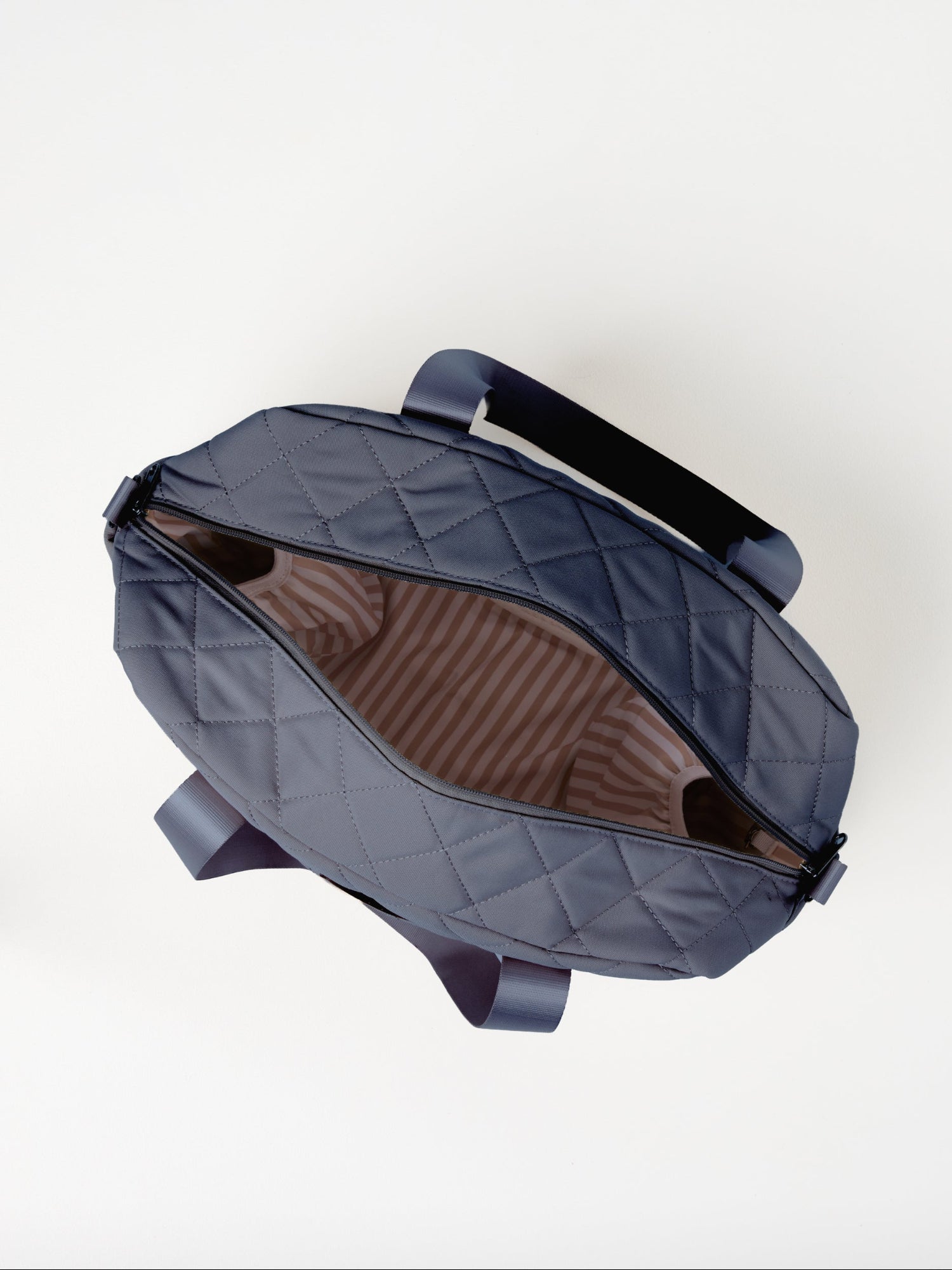 Dusty Blue Quilted Nappy Bag flat lay product image with spacious storage compartments