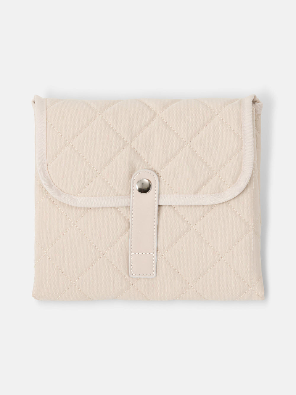 Sand quilted change mat folded closed with snap tab