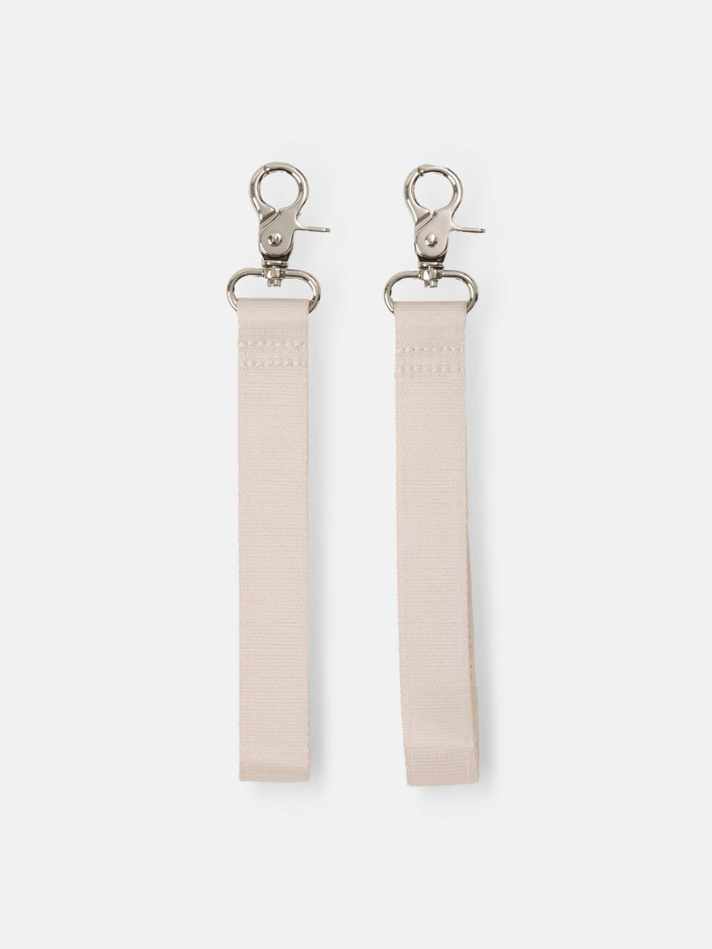 Pair of sand Velcro pram straps with silver swivel clips