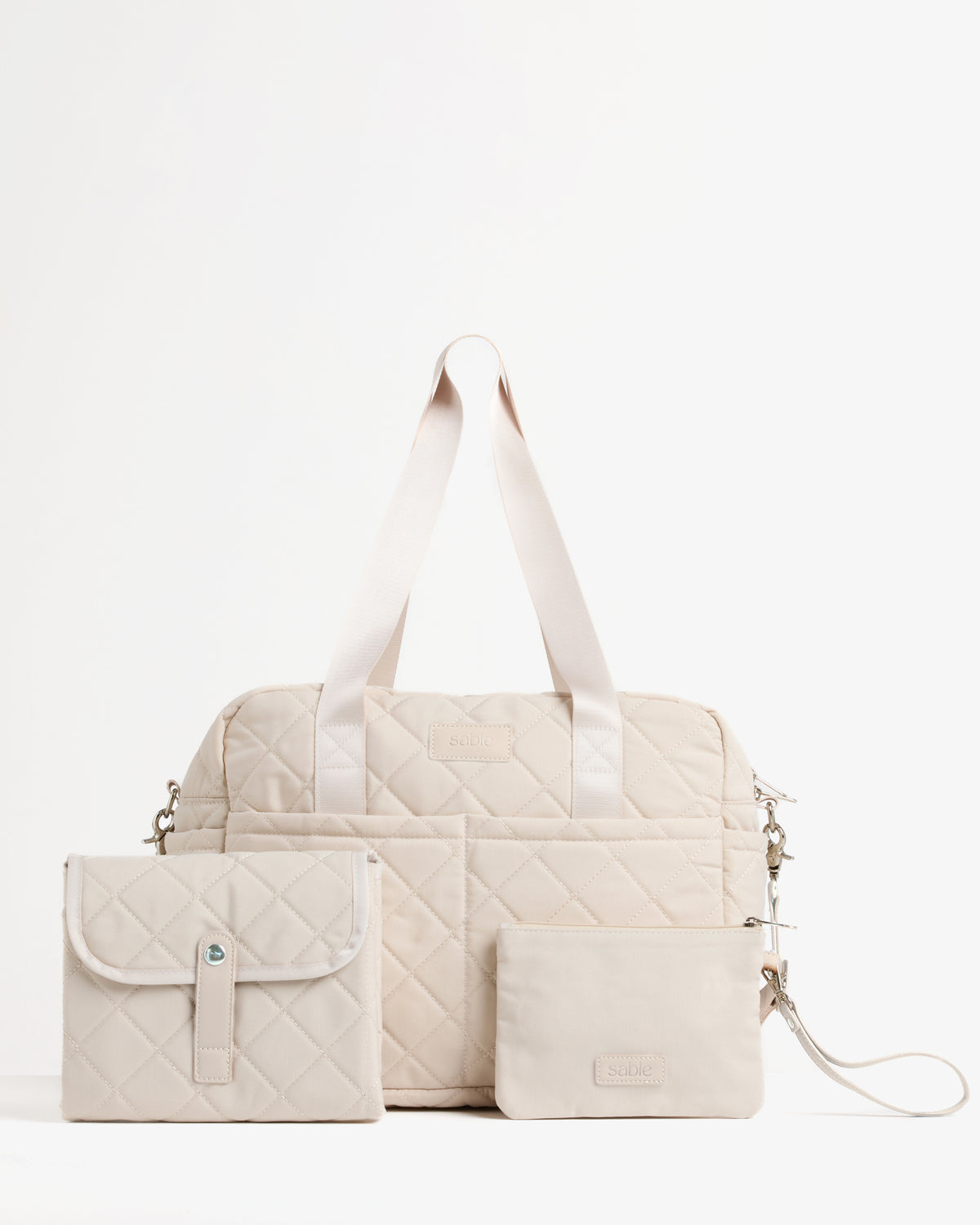 Sand quilted nappy bag with matching change mat and Essentials Pouch