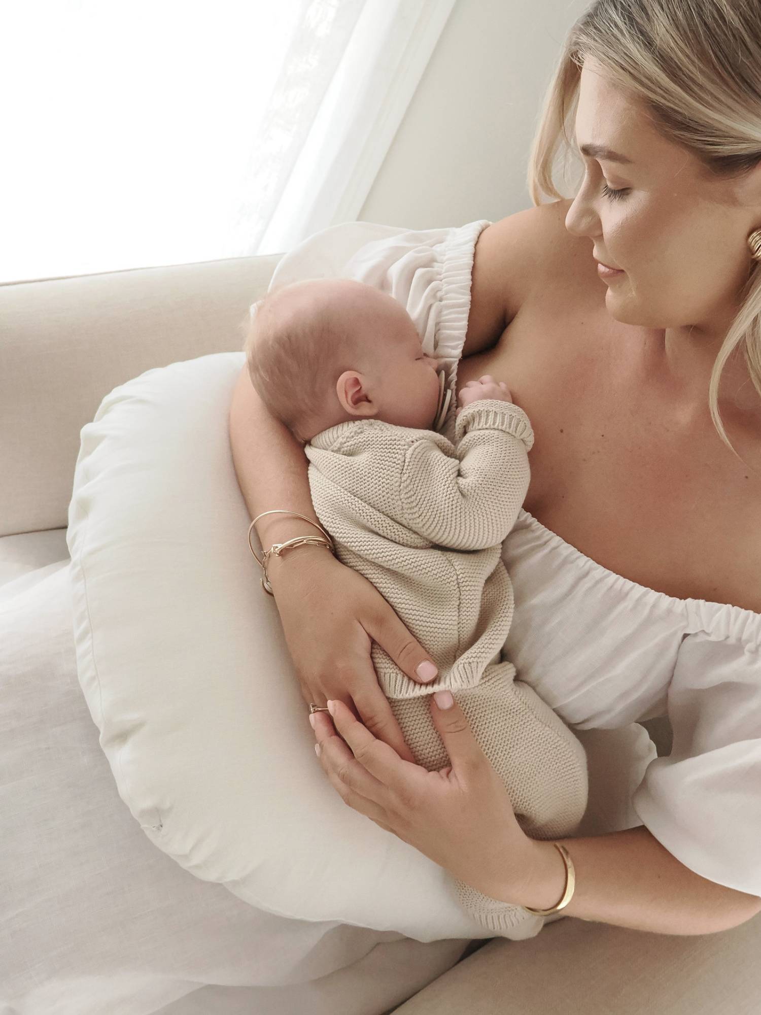 White linen nursing pillow with baby lifestyle linen nursing pillow for newborn feeding support and postpartum comfort newborn must have